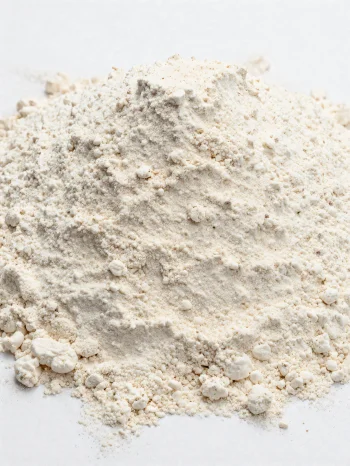 Spelt flour in a ceramic bowl, natural, light brown shade