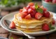 Strawberry cheesecake crepes plated