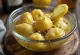 Spicy pickled artichokes in a jar