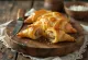 Cornish pasty with puff pastry, rich beef filling, crispy golden brown
