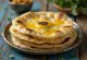 Stack of fresh buttery roti flatbreads