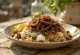 Mujaddara with yogurt, served with roasted onions
