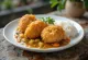 Crispy breaded oysters served with Japanese curry sauce