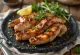 Grilled rattlesnake meat on a board
