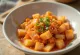 Kkakdugi - cubed radish kimchi in a bowl