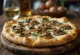 Pizza ai Porcini friss vargányával és mozzarella sajttal