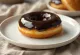 Vegan doughnuts glazed with chocolate