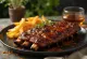 BBQ ribs served with spicy potato wedges