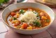 Minestrone with Parmesan cheese, served sprinkled with freshly grated cheese