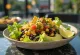 Vegan taco salad with tortilla chips and fresh vegetables