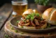 Steamed bao buns filled with roasted duck