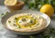 Tahini lemon sauce served with pita and grilled vegetables