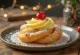Zeppole di San Giuseppe filled with vanilla cream and topped with cherries