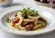 Caramelized leeks with plums and rosemary garnished with fresh cilantro