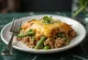 Baked green bean casserole with meat and rice