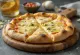 White pizza served with ricotta, mozzarella and fresh herbs