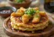 Katsu pancake with crispy breaded meat and sauce