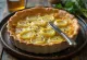 Savory leek and farmer's cheese pie garnished with fresh parsley