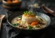 White miso Zoni soup with toasted mochi and vegetables