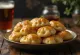 Beer dumplings served with fried onions and butter