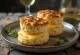 Flaky cheese biscuits on a plate