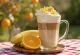 Banana-orange latte with orange zest garnish