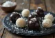 Chocolate coconut truffles (Narkel Naru) piled up
