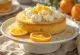 Vanilla Orange Cake decorated with slices