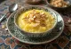 Saffron and Almond Kheer served in a bowl, garnished with nuts