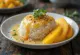 Mango sticky rice served on a plate