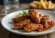 Spicy BBQ chicken wings served hot