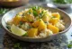 Creamy Coconut Aloo Gobi garnished with cilantro