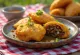 Golden brown Carimañola stuffed with ground beef
