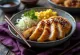 Sesame Tonkatsu bowl with breaded fish and fresh cabbage salad