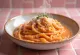 Creamy rosemary tomato sauce served in a bowl