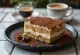 Tiramisu mousse cake dusted with cocoa