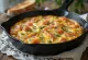 Frittata with smoked salmon and dill, golden brown dish