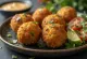 Crispy golden falafel with fresh herbs.