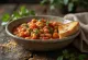 Greek baked giant beans served with whole wheat toast