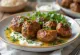 Spicy lamb kofta served with fresh yogurt and parsley