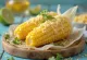 Elote with Mayonnaise - fresh corn served with mayonnaise, cheese, and sour cream
