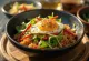 Spicy Chili Rice Bowl with fried chili, egg, and salad