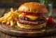 Steak burger with cheddar and fresh vegetables