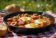Lecsó with sausage and eggs served