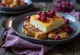 Leipäjuusto with cloudberry mousse, served with blueberries and cream