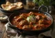 Lamb Vindaloo served in spicy sauce