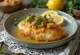 Sage chicken with crispy skin served with fresh herbs