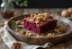 Beetroot walnut cake slice served on a plate